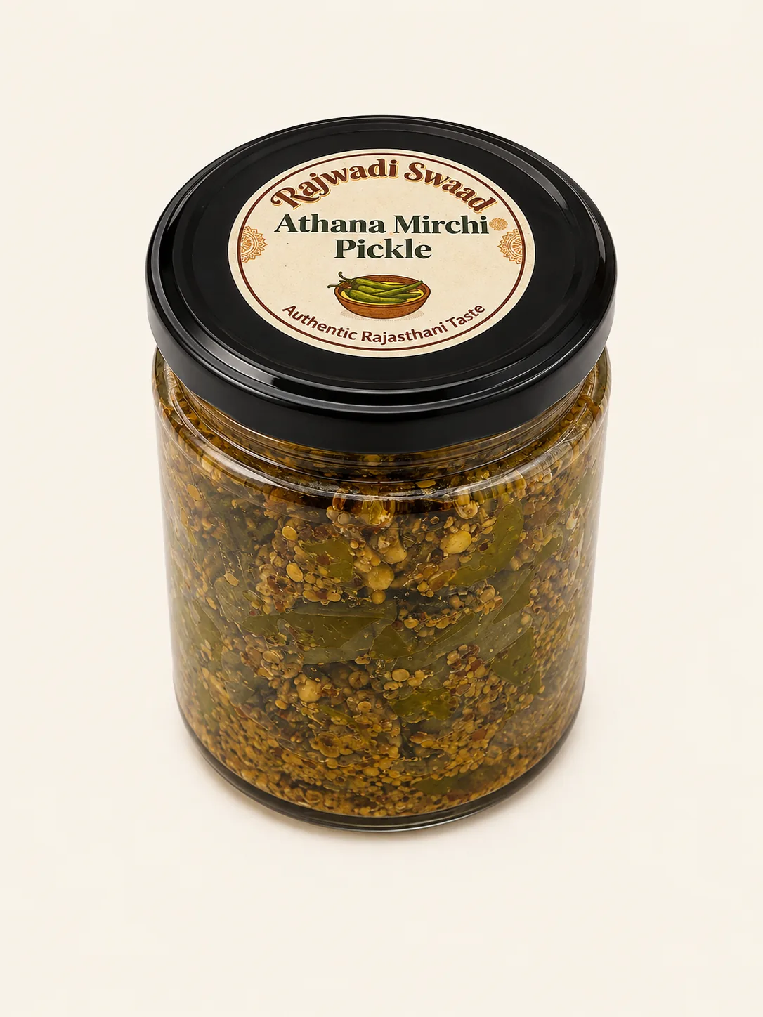 Rajwadi Swaad athana mirchi pickle jar on a warm cream background.